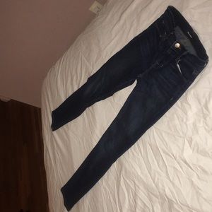 Skinny dark blue jeans